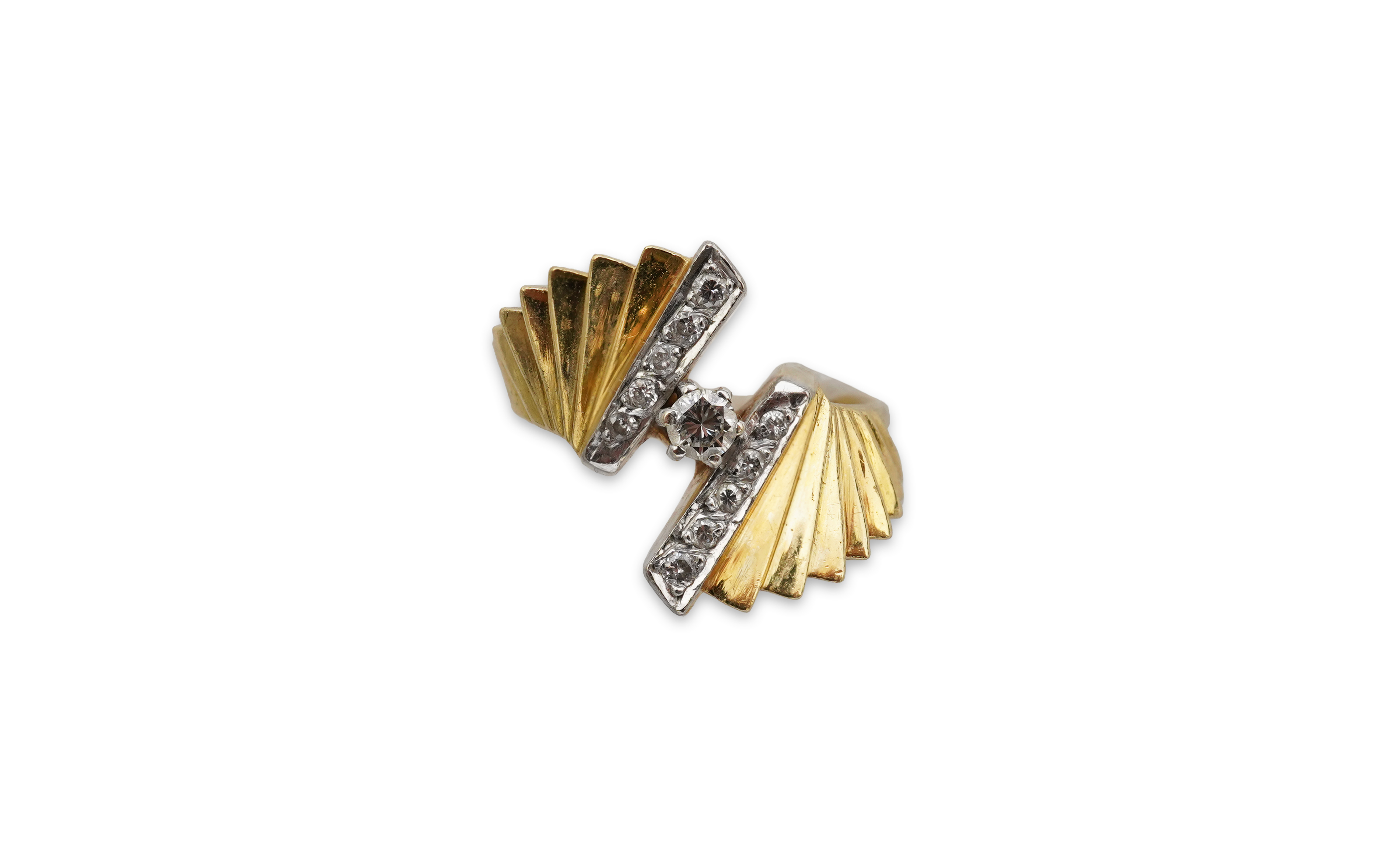 A gold and diamond dress ring